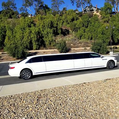 Lincoln Continental stretch limousine on a hillside road