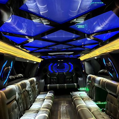 Leather lounge seating inside the 2024 Escalade limousine