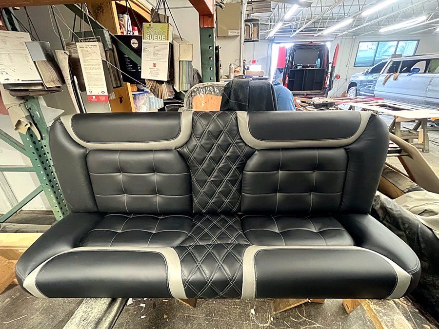 Custom seat frames being fitted in the 2024 Escalade limousine